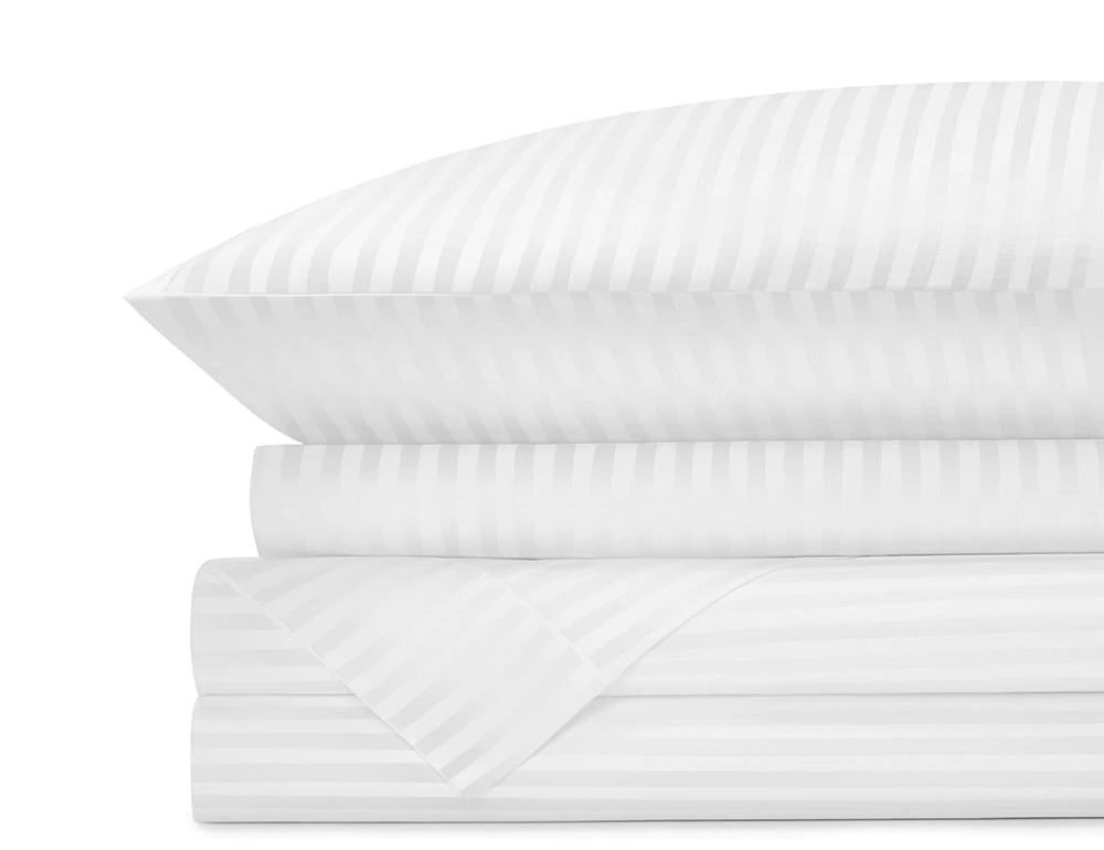 Standard Textile's Comfortwill sheets, which are white with alternating white stripes. 
