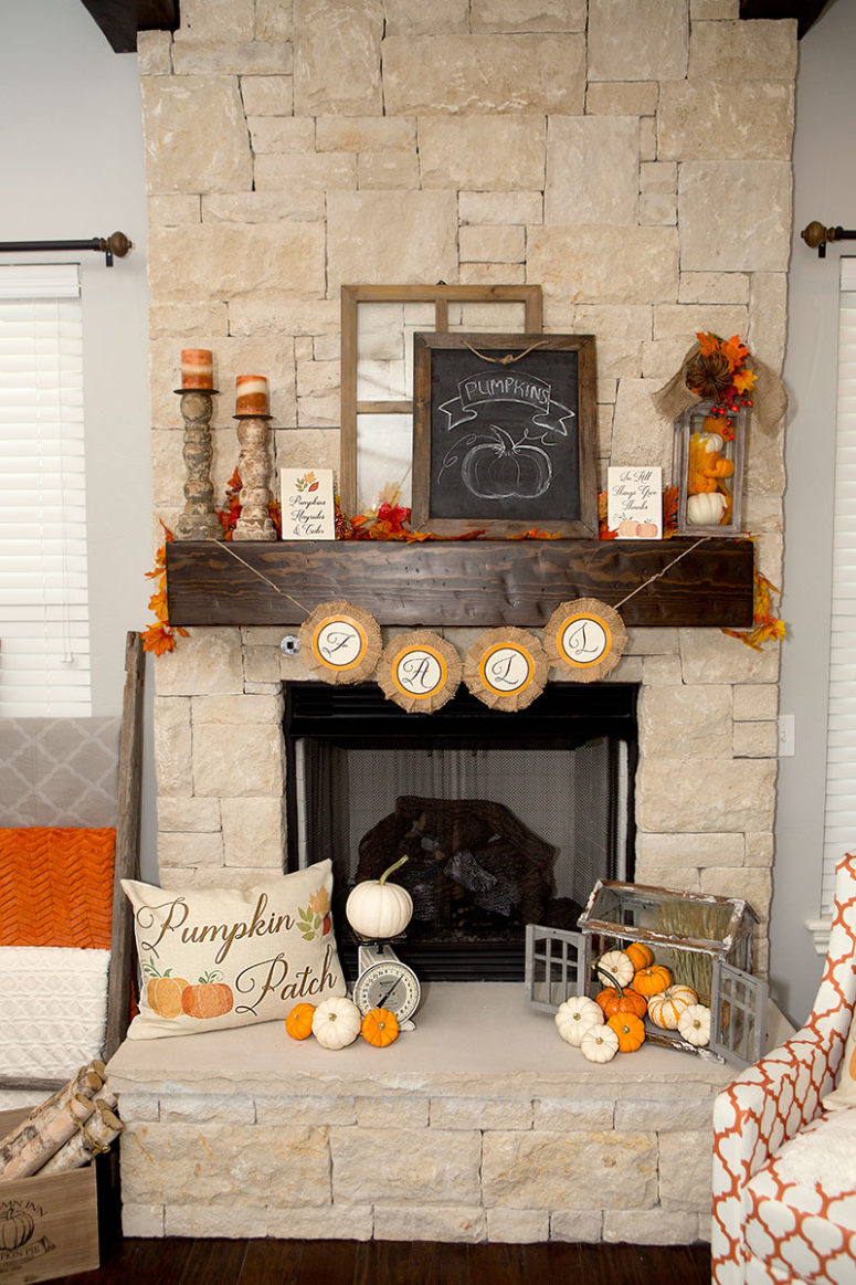 fall decorations on a fireplace
