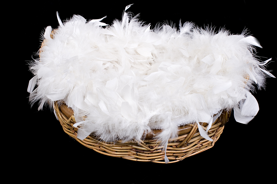 a basket full of white feathers