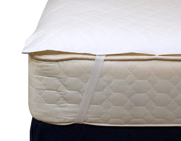 a mattress pad with anchor bands strapped to a mattress
