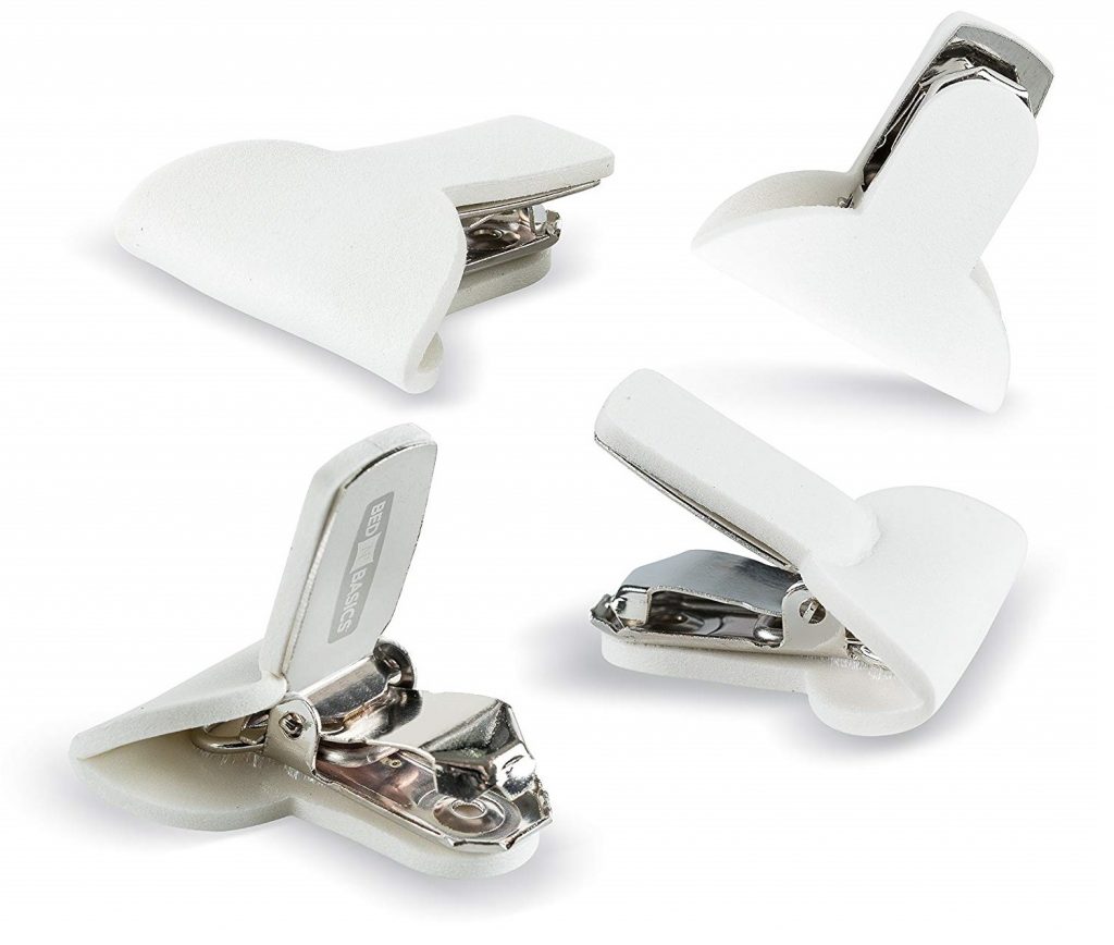 a set of comforter clips, which are used to keep a comforter in place