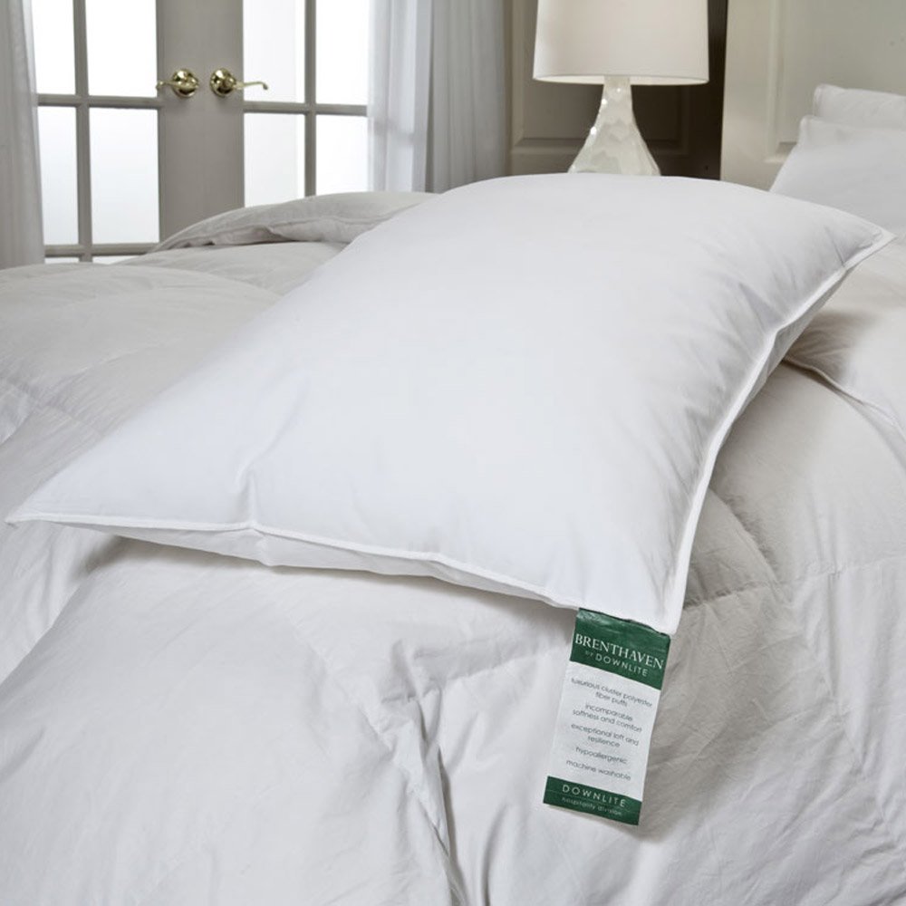 A Downlite hotel pillow on a bed