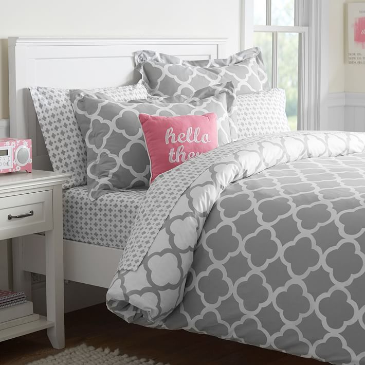 a grey and white reversible duvet cover set