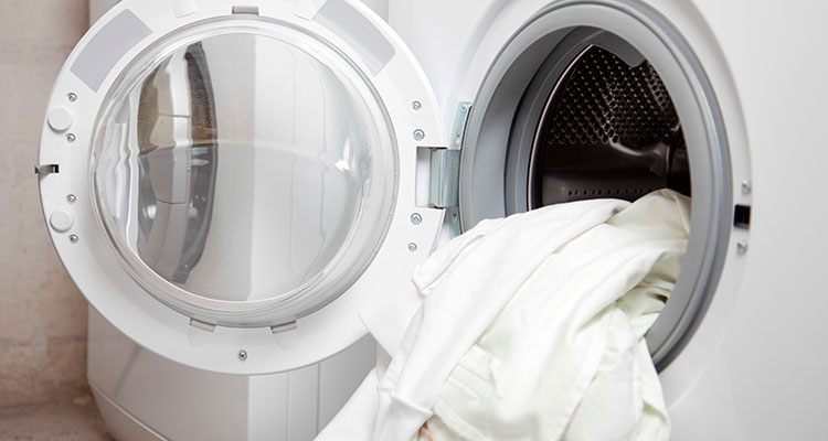 bedding items being washing in a washing machine