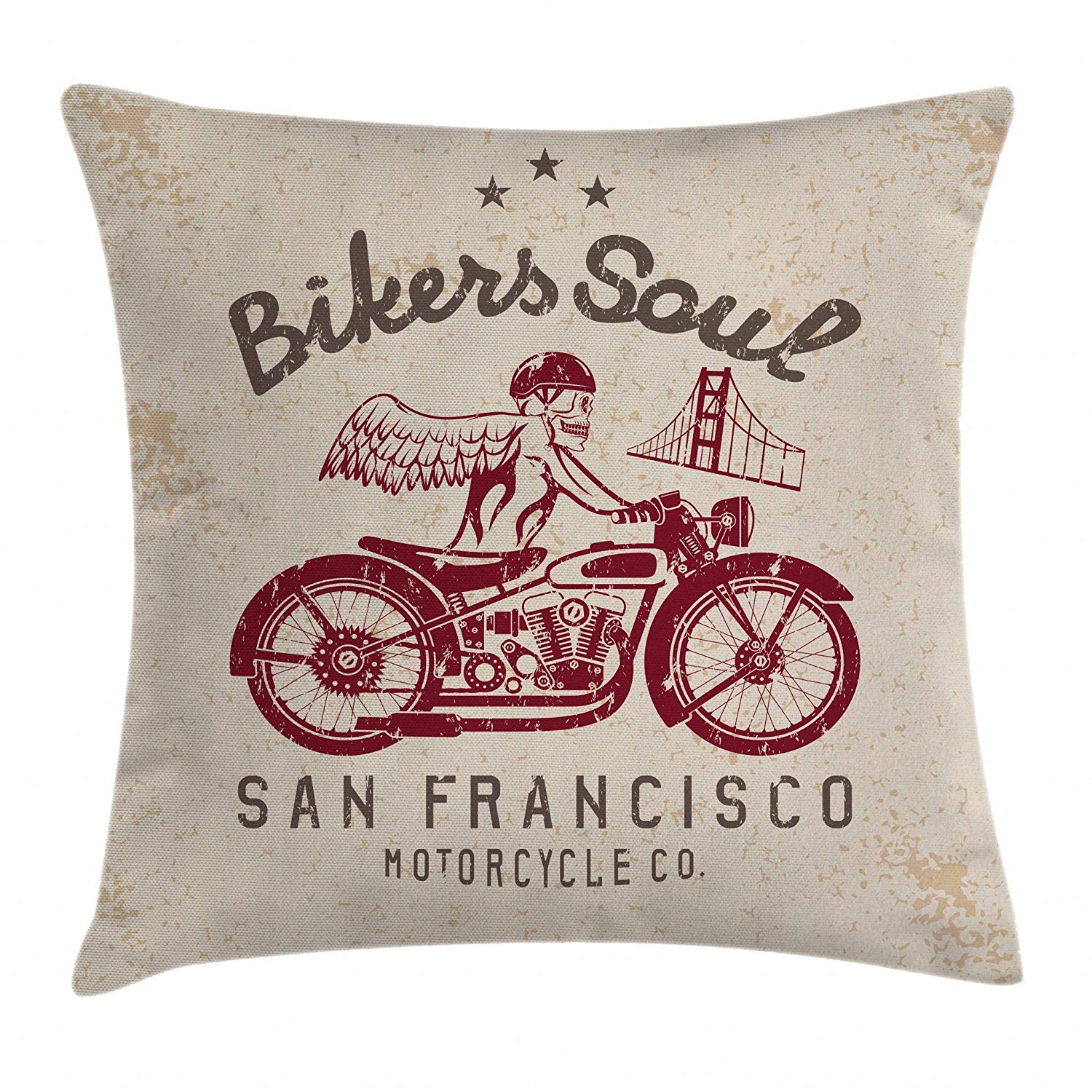 a pillow with a winged skeleton riding a motorcycle