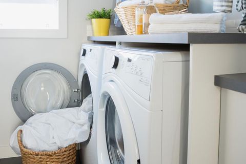a laundry room with a washing machine and a dryer