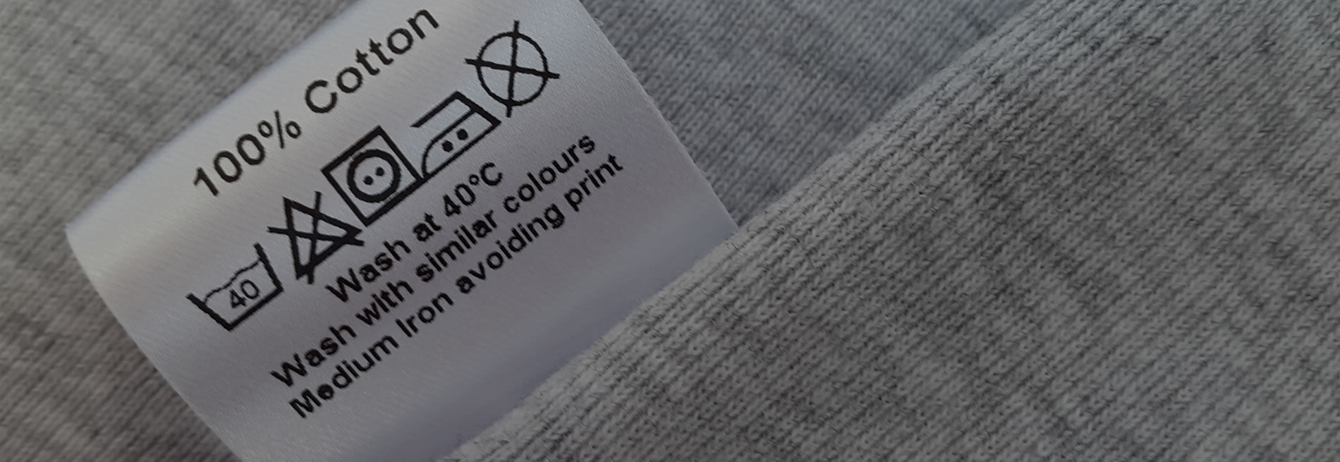 a cotton fabric with attached material and care tag