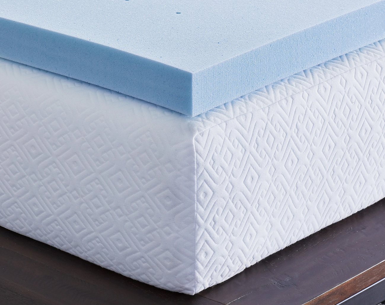 a gel memory foam topper on a mattress
