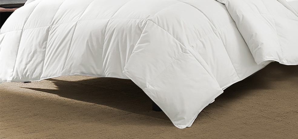 the corners and edges of a Downlite 550FP comforter