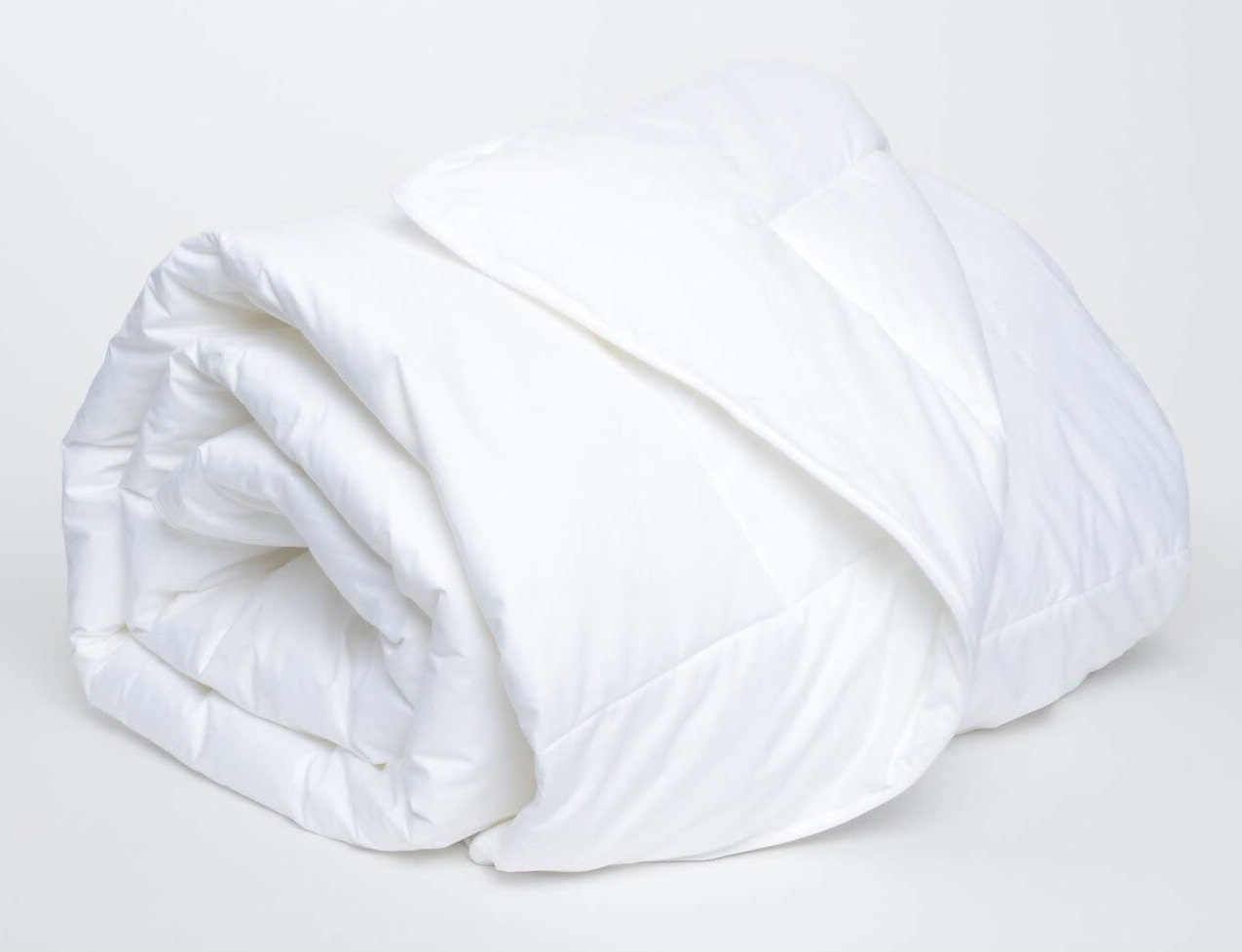 a rolled up down alternative comforter