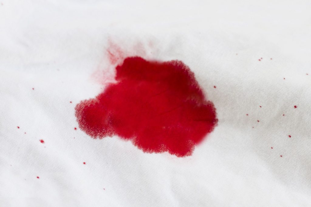 a blood stain on a white sheet
