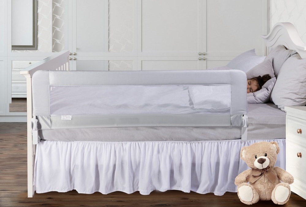 a bed rail at the edge of a child's bed