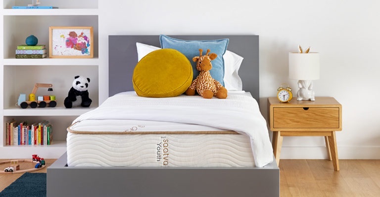 A Saatva youth mattress in a child's bedroom