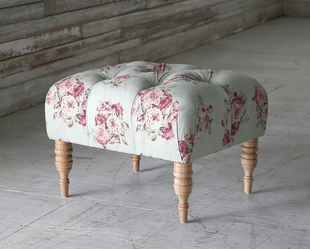A Shabby Chic Fifi Tufted Ottoman in Manor Floral Sage design