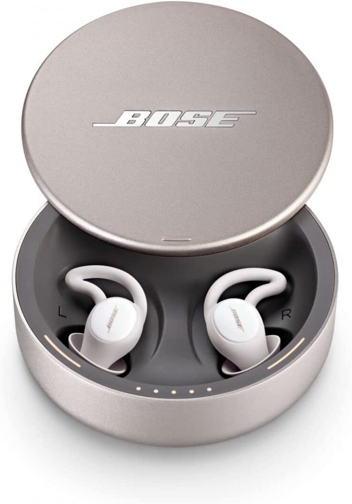 a set of Bose Sleepbuds II in their charging case