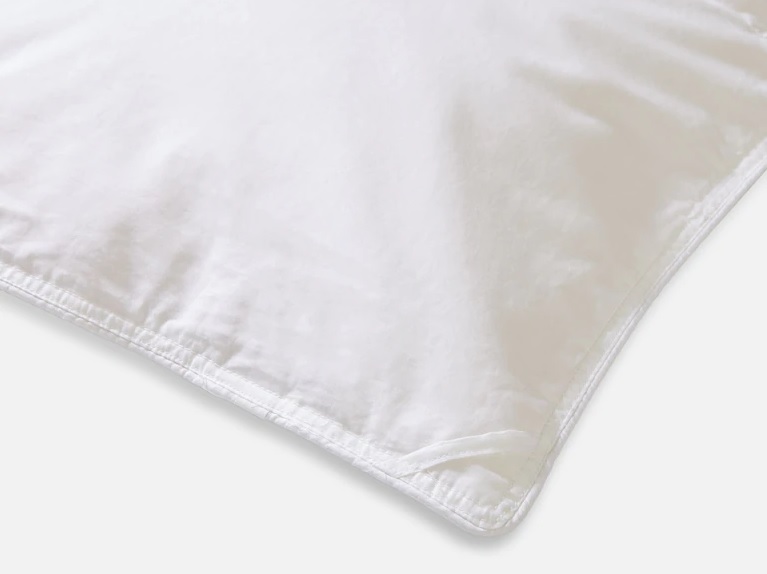 the edge of a comforter, showing the duvet loops