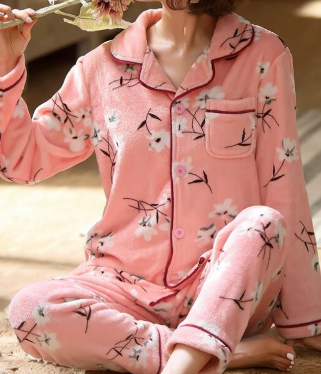 a woman wearing fleece pajamas