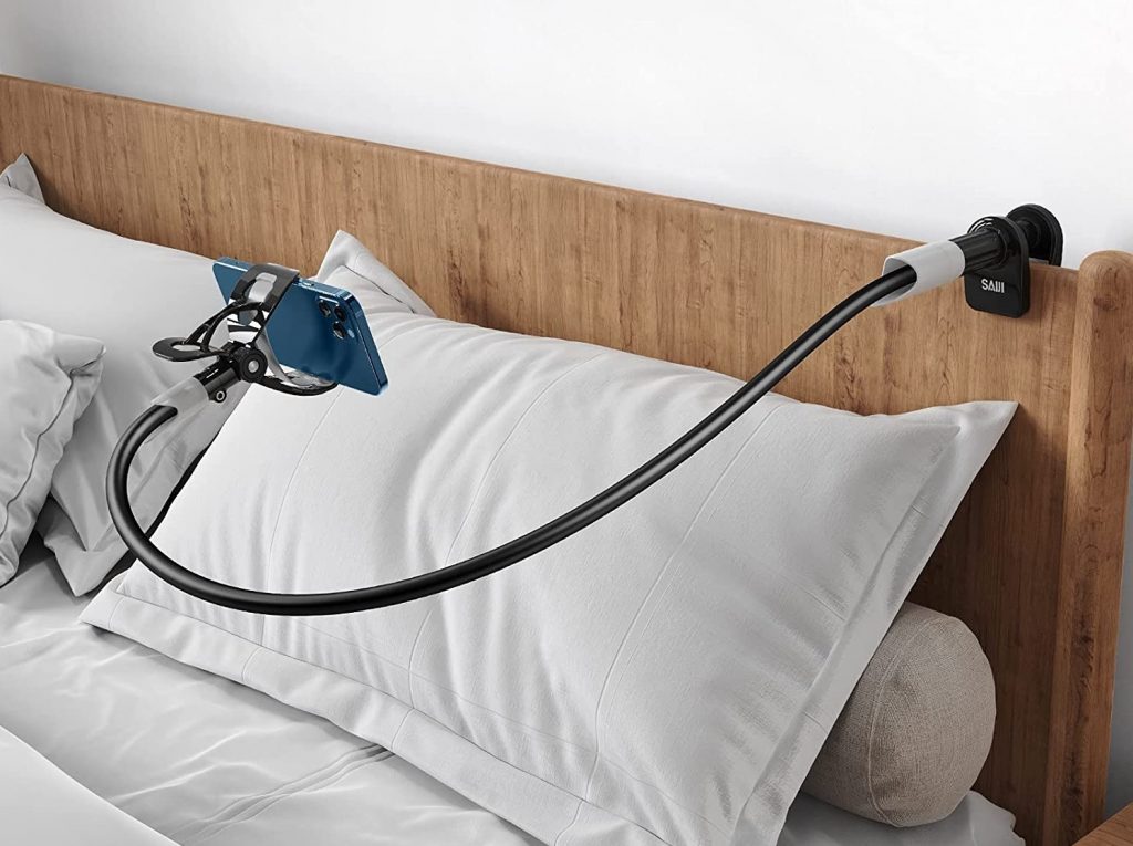 a gooseneck phone mount attached to a headboard